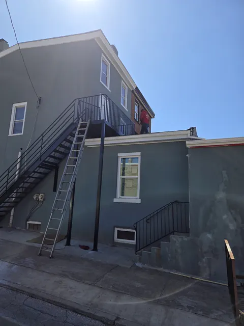 Exterior stairs to a second-floor entrance