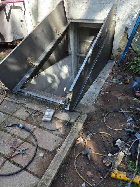 Steel basement door